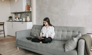 A woman sitting down alone